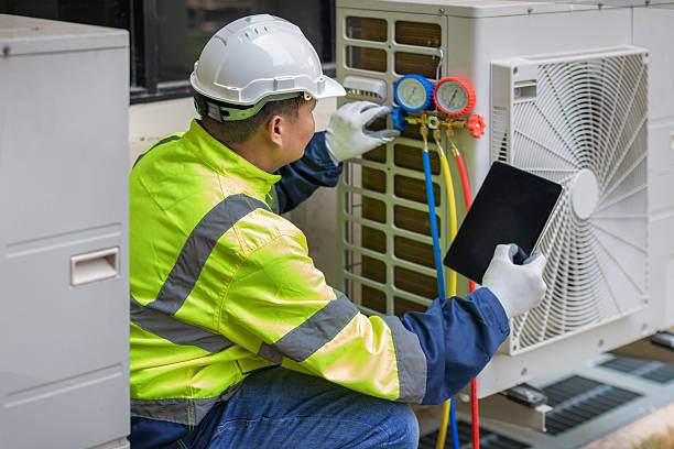 Professional Heat Pump Repair technician working in Fonda, NY